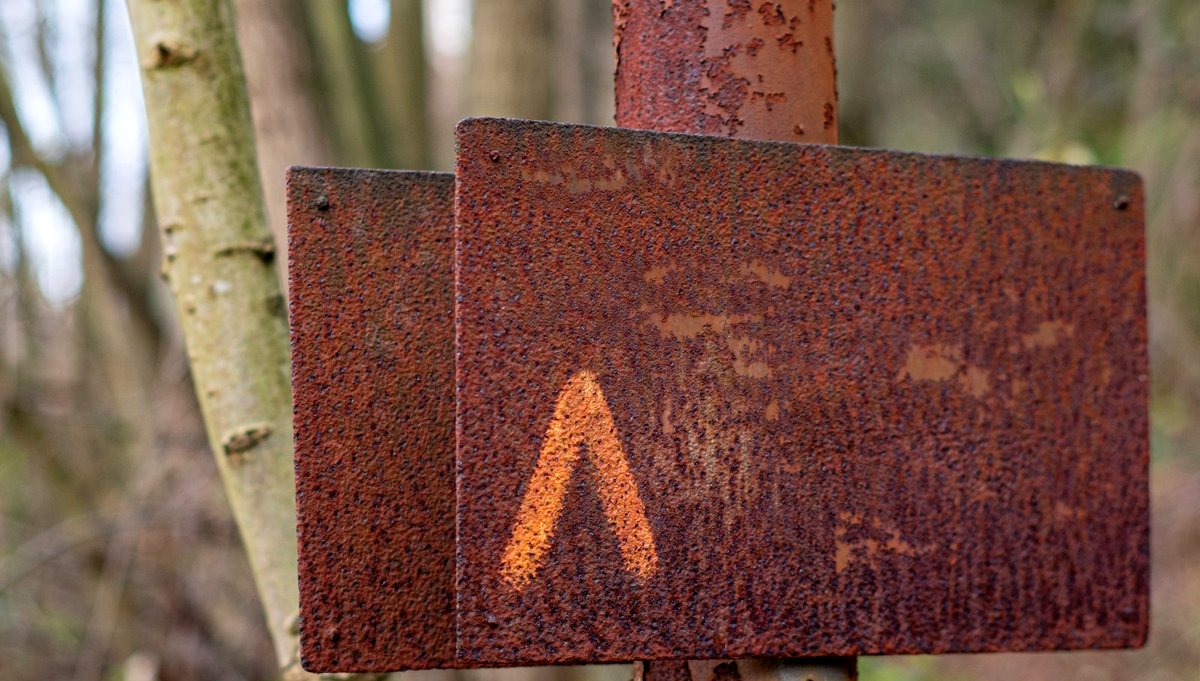 A rusty sign, weathered by years