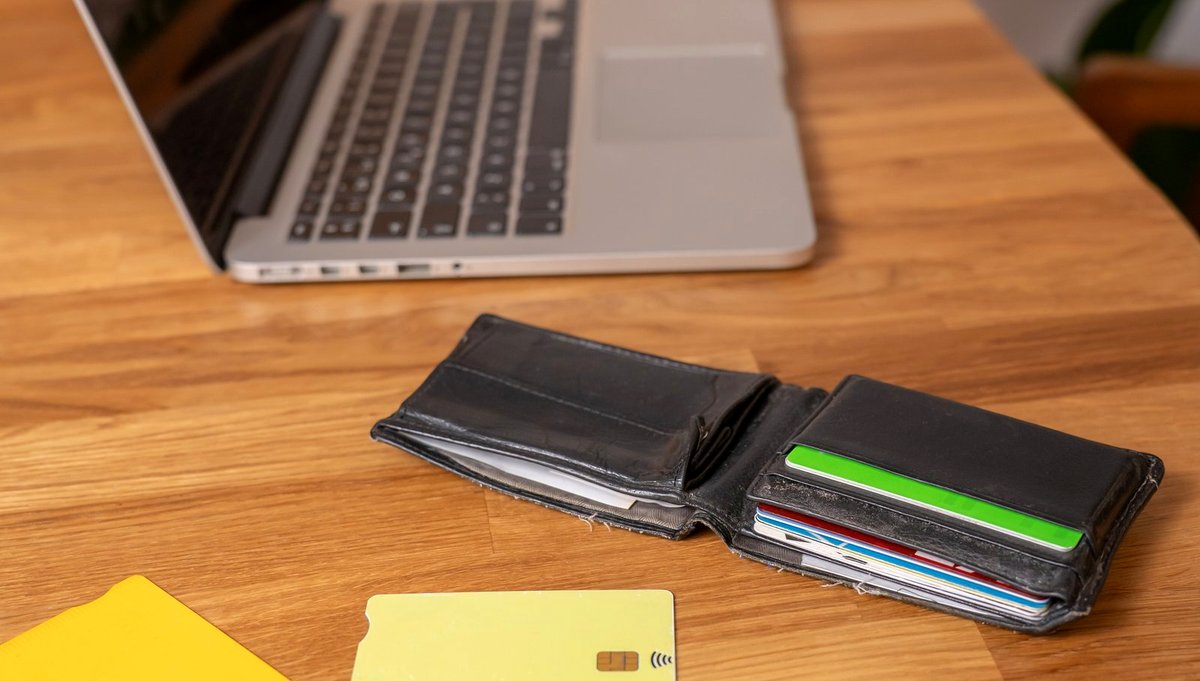 A wallet of cards on a table